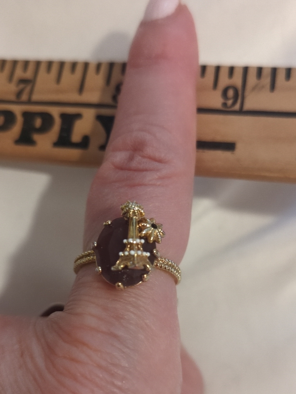 Gold-Plated Eiffel Towel Accent Ring with Deep Purple Stone